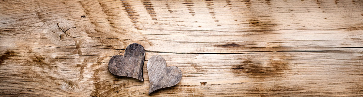 two hearts on a wooden table